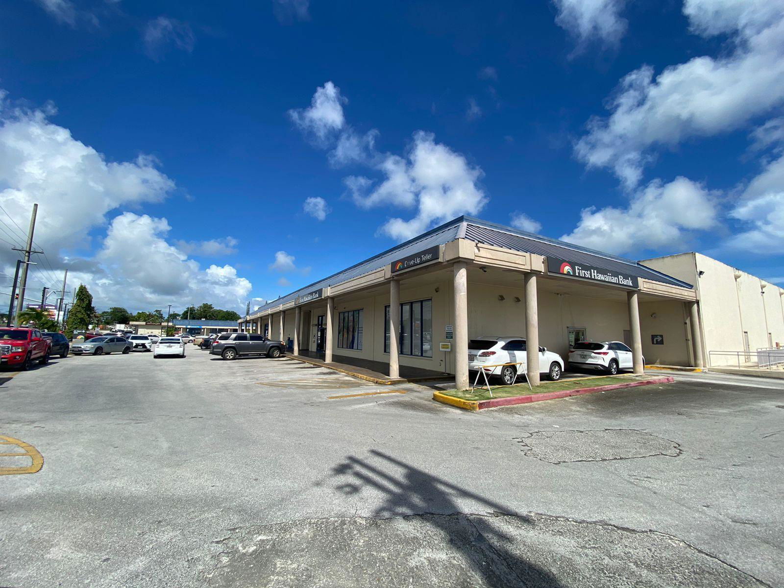 The First Hawaiian Bank's Dededo branch was closed Friday afternoon. Police said a robber took an undisclosed amount from one of the teller counters.