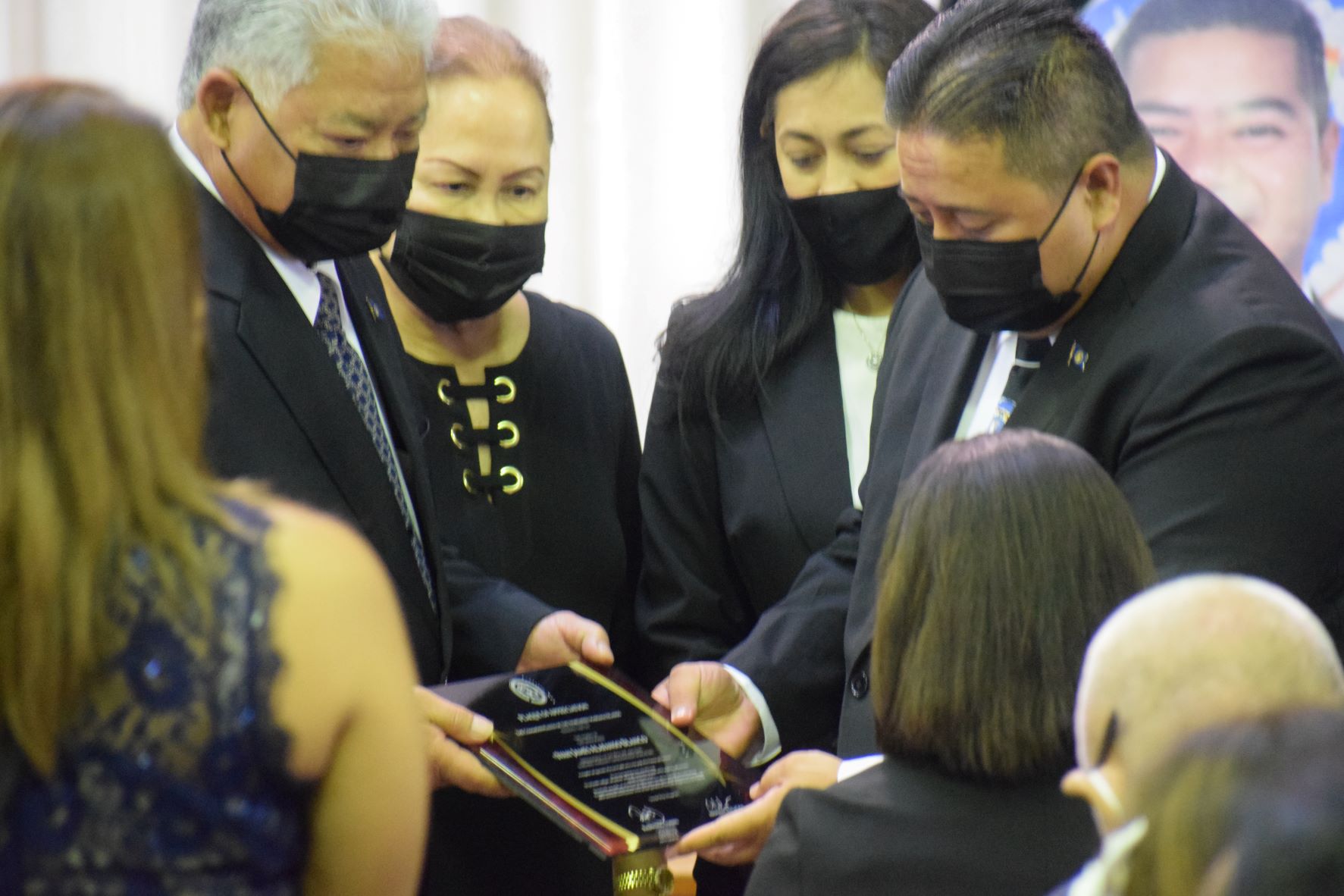 Gov. Ralph DLG Torres and Lt. Gov. Arnold I. Palacios present the executive branch’s tribute to the family of Rep. Ivan Blanco.