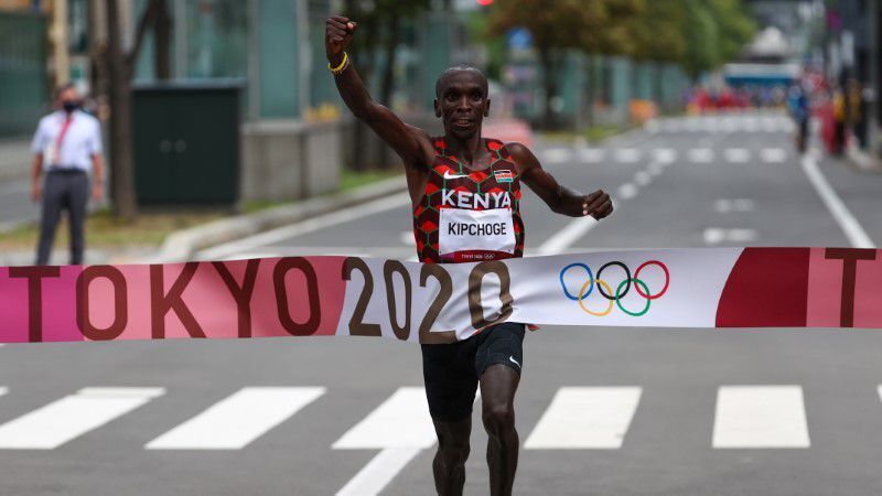 Eliud Kipchoge of Kenya crosses the finish line to win gold in  the Olympic men's marathon at Sapporo Odori Park in Sapporo, Japan on Sunday.