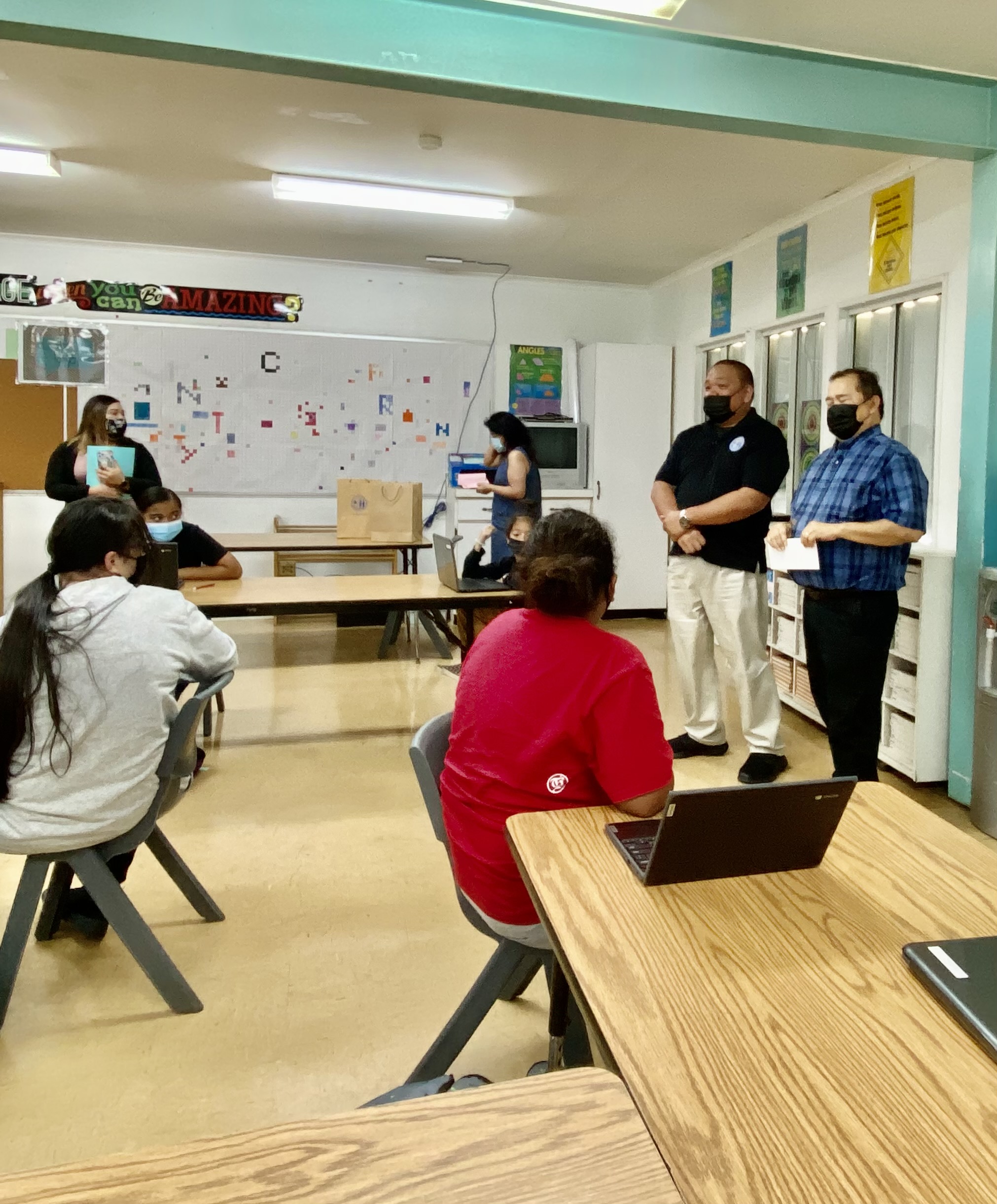 Commissioner of Education Dr. Ada and Associate Commissioner Eric Magofna meet with students.
