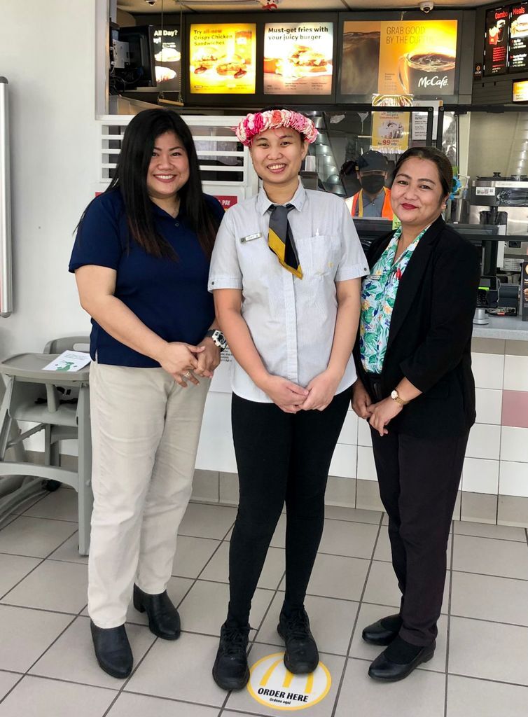 Jamie Rose Bartolome, center, is  a certified people department manager.