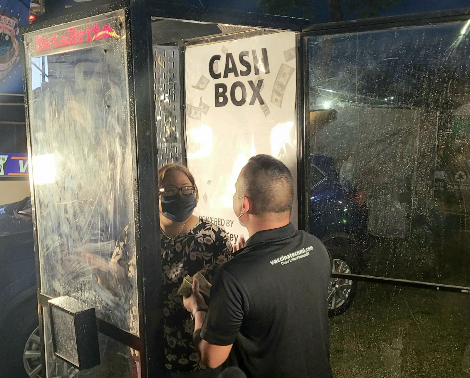 Commonwealth Healthcare Corp. Chief Executive Officer Esther L. Muna was the first to try out the Turnkey Solutions Cash Box on Saturday.