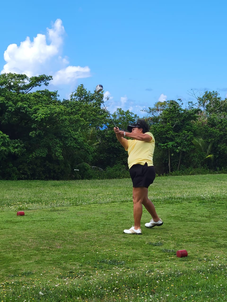 Lorraine Babauta tees off during the CNMI Women's Golf Association Ace of the Month Tournament on Saturday at Laolao Bay Golf & Resort.