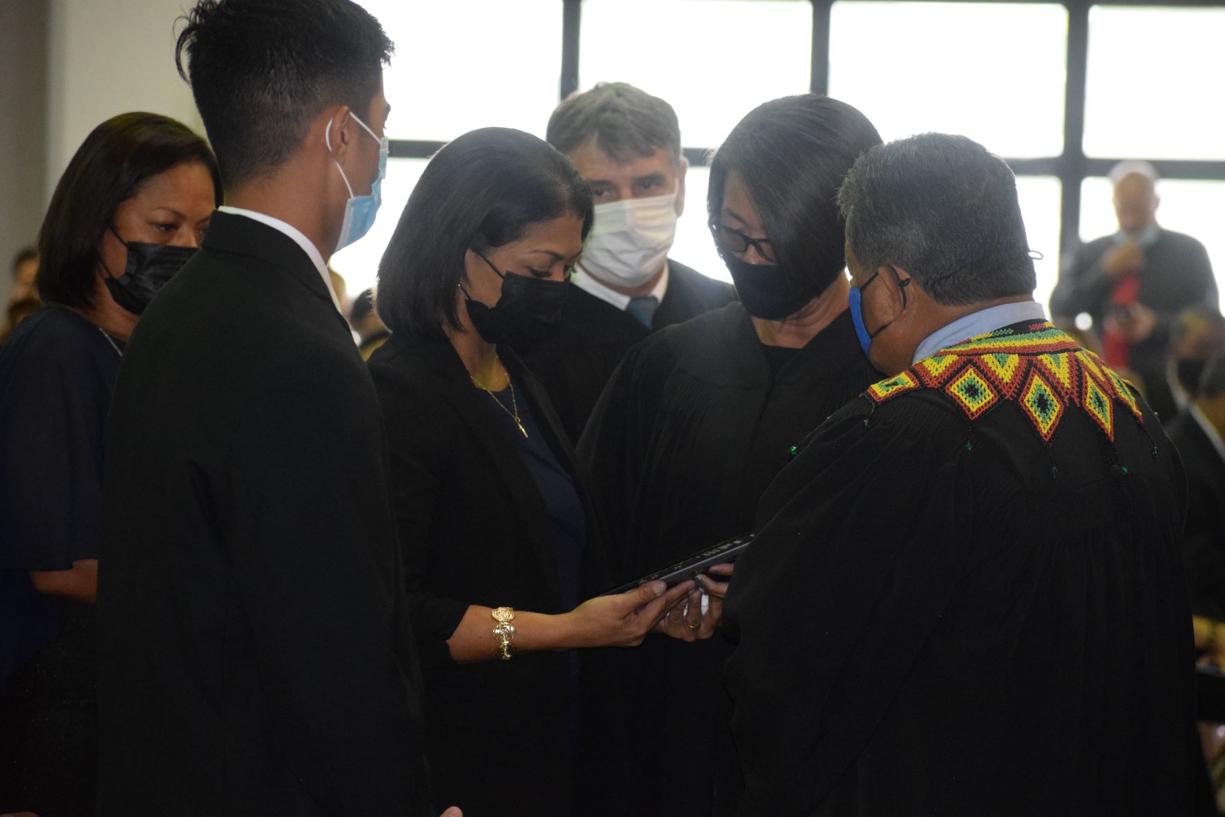 The officials of the judiciary present their tribute to the family of Rep. Ivan Blanco.