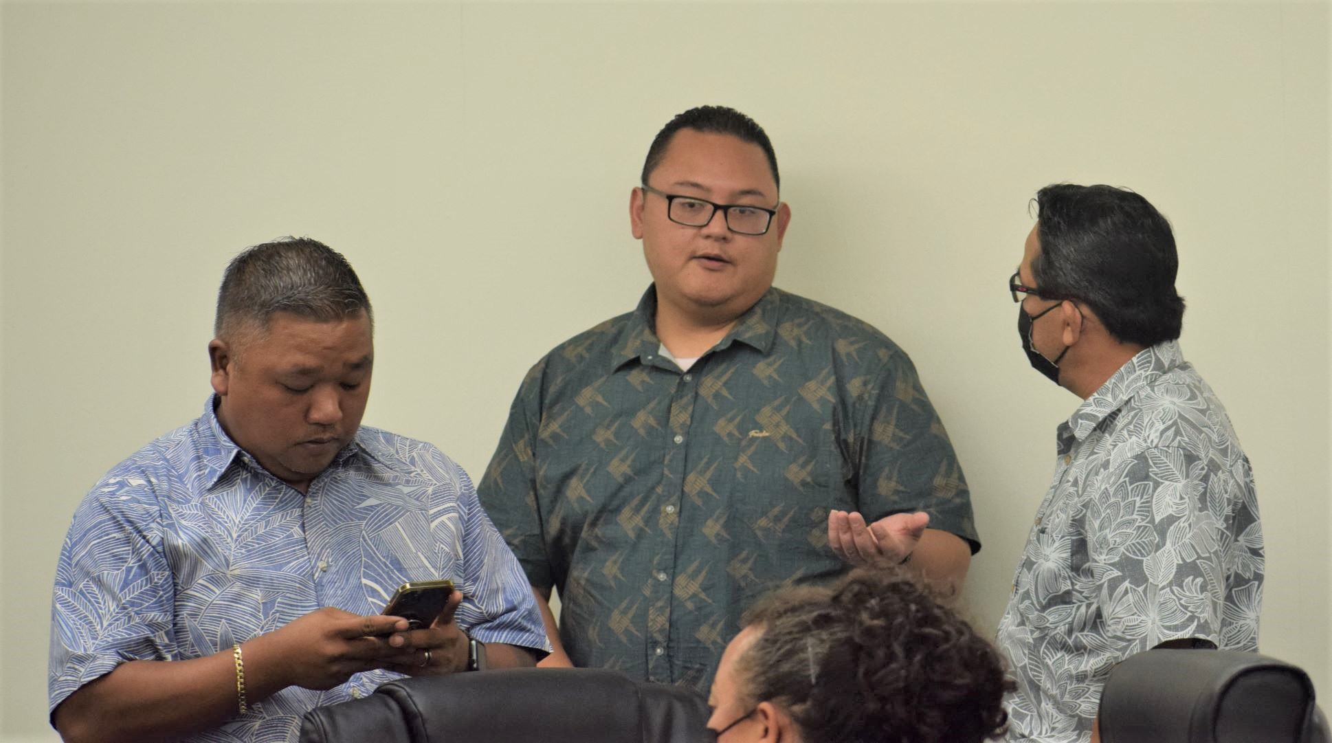 House Ways and Means Committee Chairman Donald Manglona, center, with Rep. Patrick San Nicolas, right, and Rep. Angel Demapan, left, during a break from a House session on Tuesday.