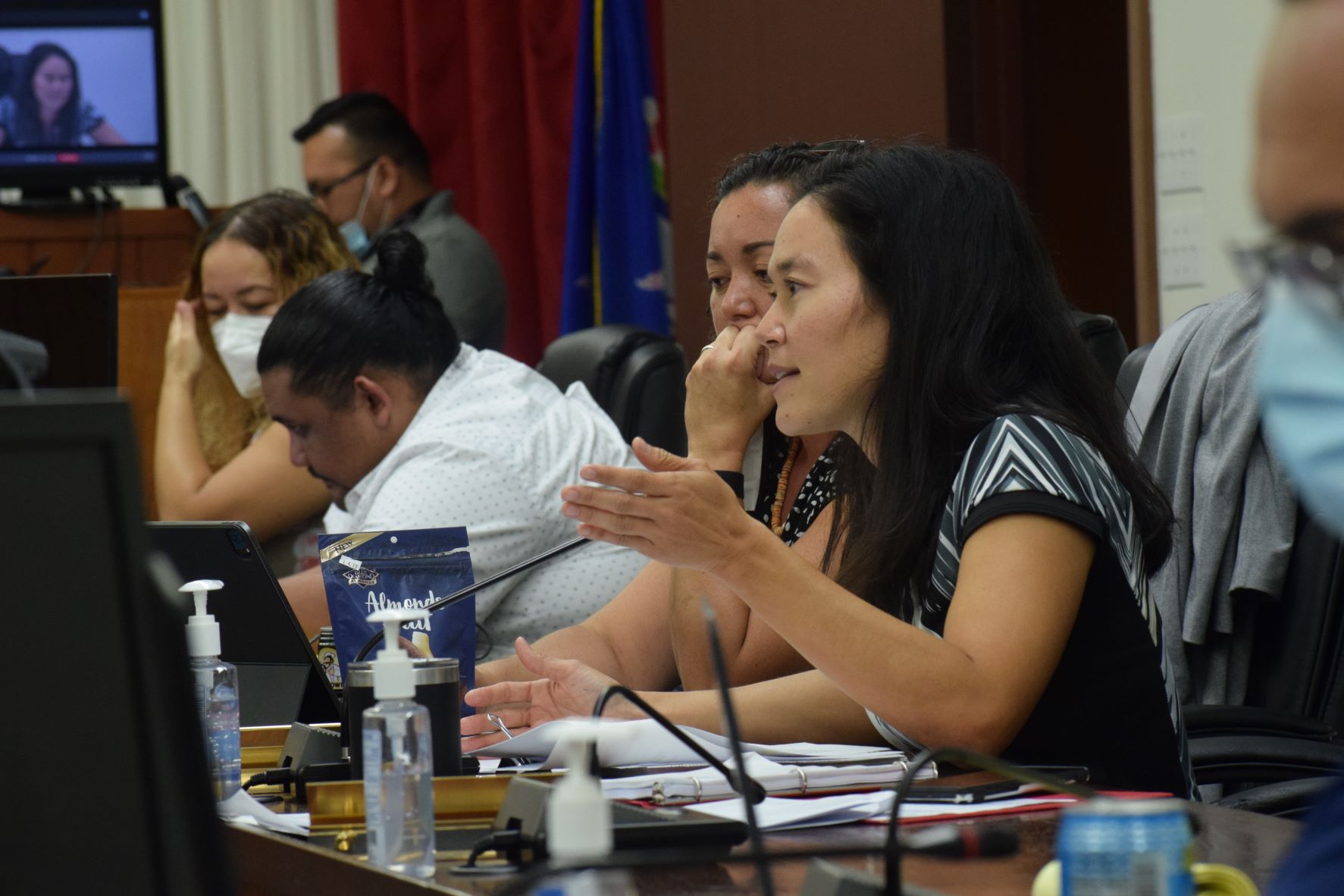 Rep. Tina Sablan, right, explains the House proposal to provide a subsidy to the Commonwealth Healthcare Corp.