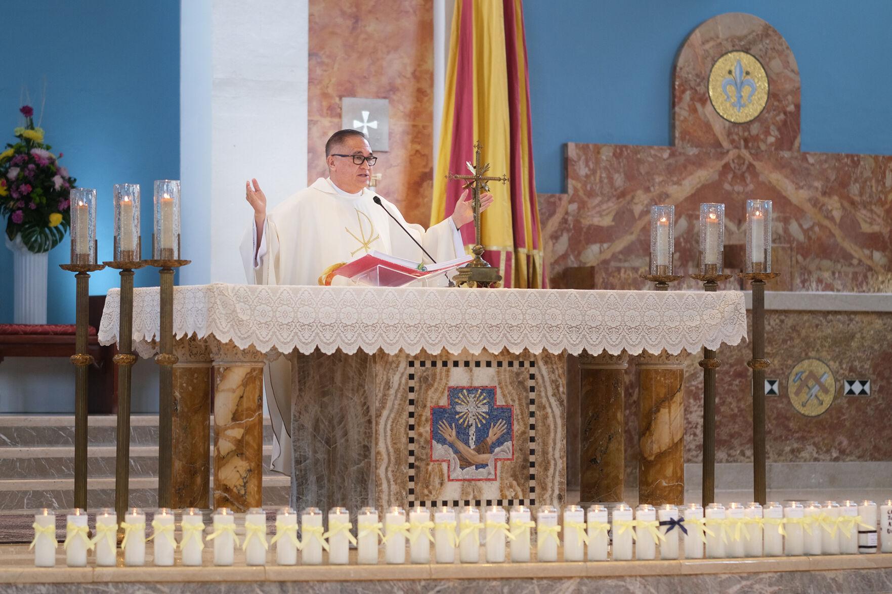 Monsignor James Benavente on Friday celebrates Mass at the Dulce Nombre de Maria Cathedral-Basilica in Hagåtña with special intention for those who died from Covid-19.
