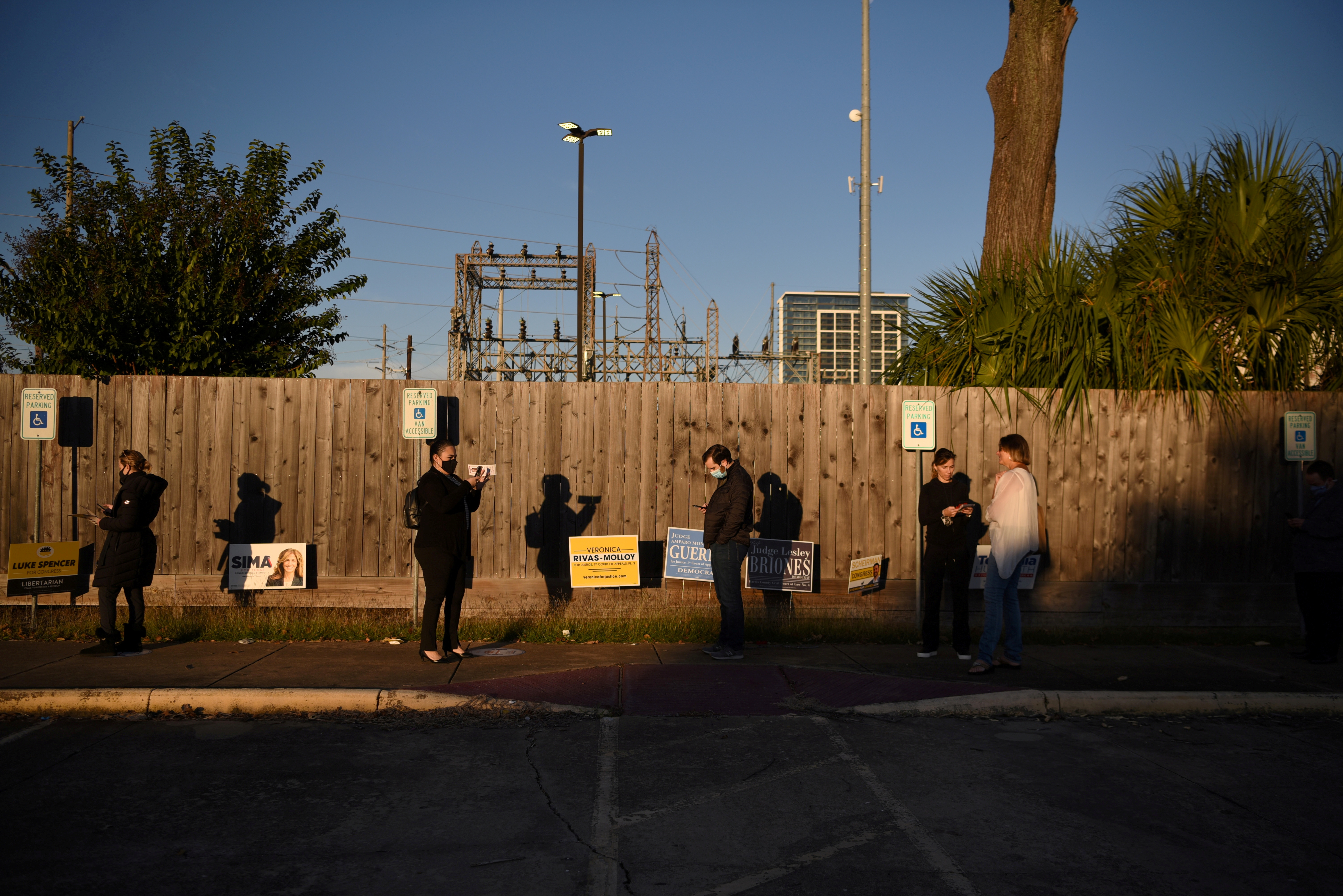 Voters line up at a polling station during Election Day in Houston, Texas on Nov. 3, 2020. 