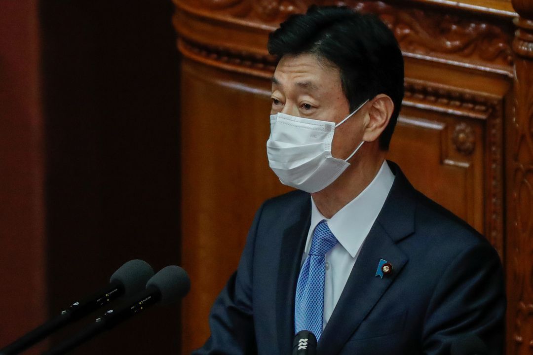 Japan's Economy Minister and minister in charge of coronavirus response Yasutoshi Nishimura delivers his policy speech at the opening of the Lower House plenary session in Tokyo, Japan on Jan. 18, 2021. 
