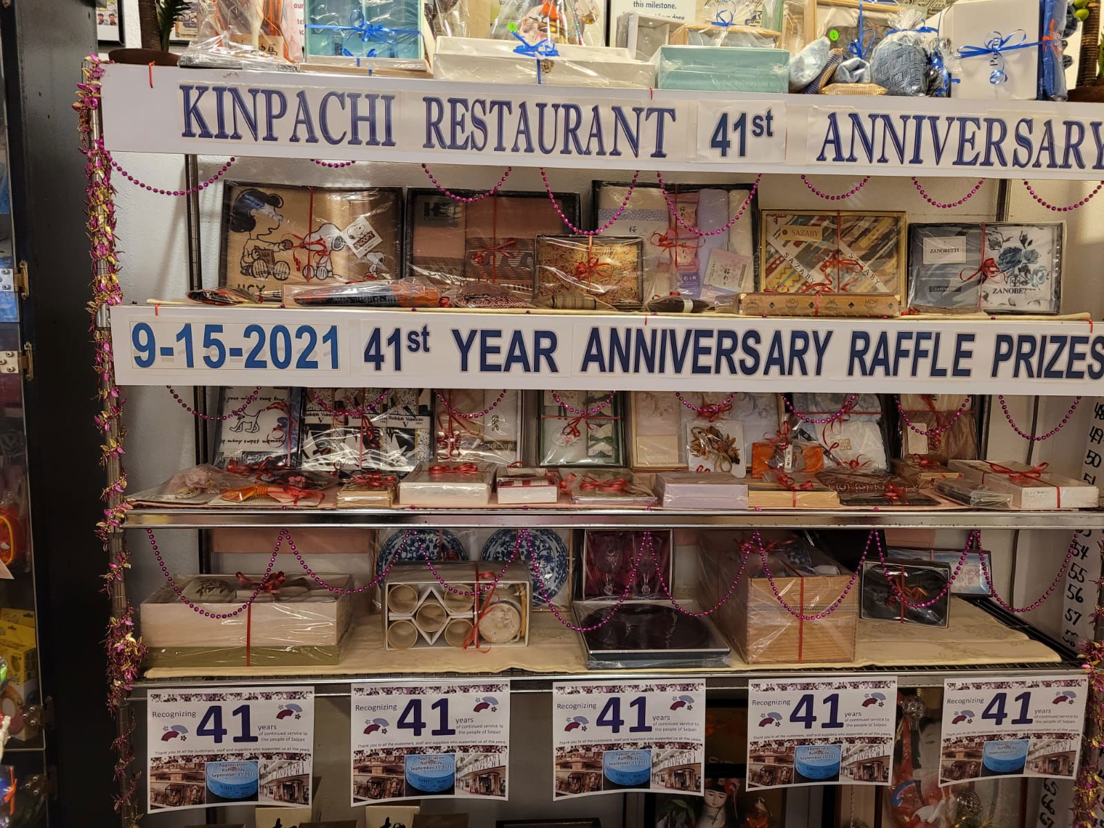 The special raffle prizes are seen on the shelves of Kinpachi Japanese Restaurant.