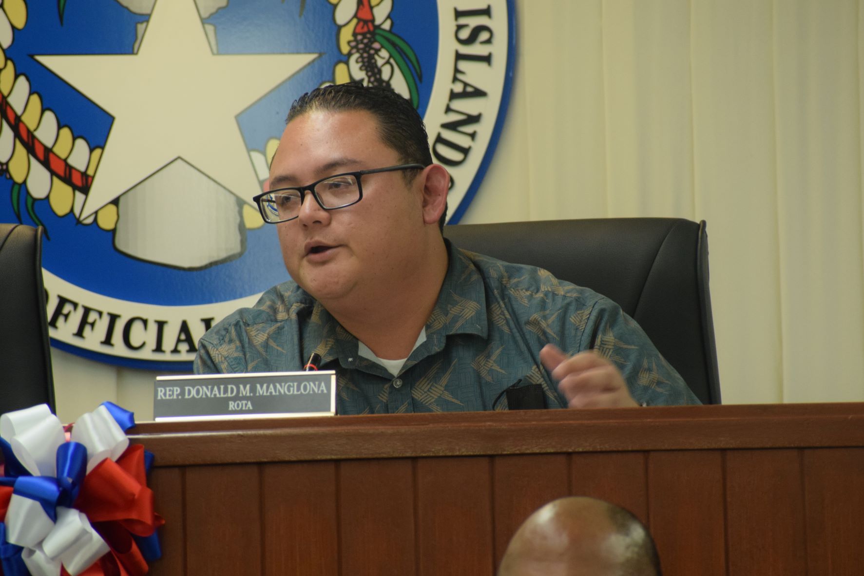 House Ways and Means Commitee Chairman Donald Manglona speaks during the bicameral conference committee meeting on Friday in the House chamber.