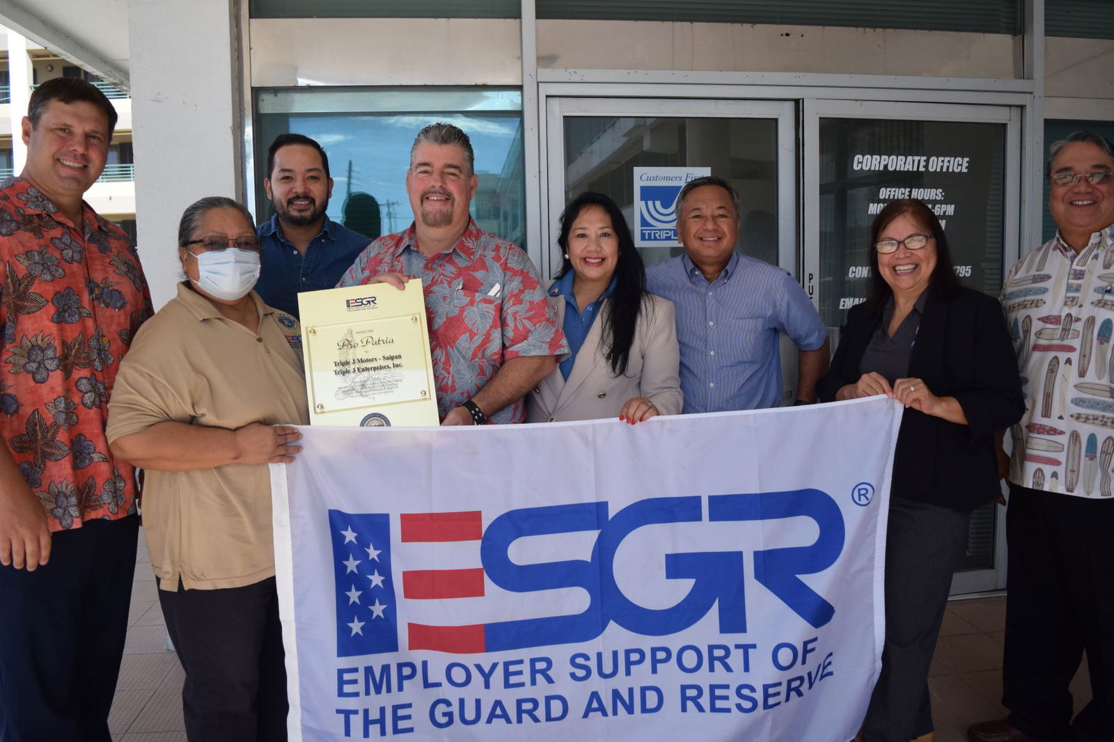 Triple J construction operations manager/senior superintendent Mario Valentino holds the Pro Patria Award he and other company officials received from ESGR Guam-CNMI area chair Rita A. Sablan, Ed.D., ombudsman Joann Aquino and employer outreach coordinator Rose Igitol on Aug. 18, 2021.