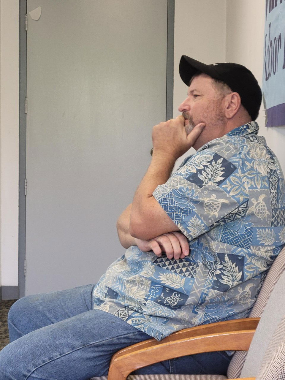 Saipan resident Del Benson listens during a Commonwealth Utilities Corp.’s board meeting on Friday morning.