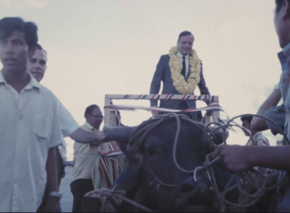 Apollo 11 astronaut Neil Armstrong is paraded on a carabao-drawn cart during a Nov. 1969 visit to Guam.