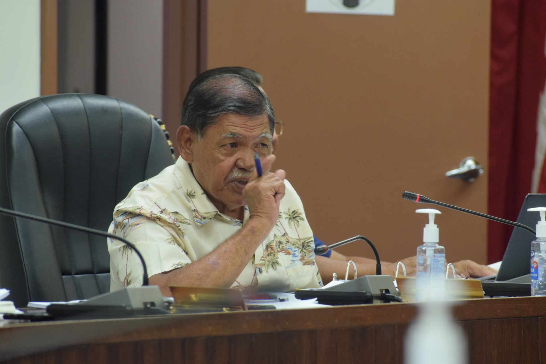 Senate Fiscal Affairs Committee Chairman Victor B. Hocog gestures as he speaks during the bicameral conference committee meeting on Friday in the House chamber.