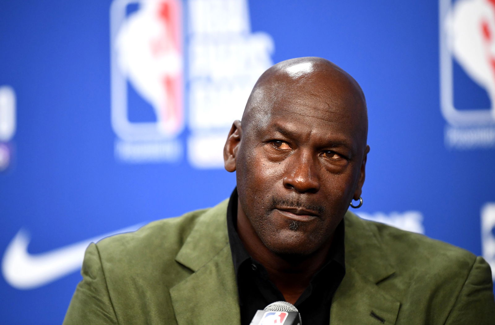 Former NBA star and owner of Charlotte Hornets team Michael Jordan looks on as he addresses a press conference ahead of the NBA basketball match between Milwaukee Bucks and Charlotte Hornets at The AccorHotels Arena in Paris on Jan. 24, 2020. 