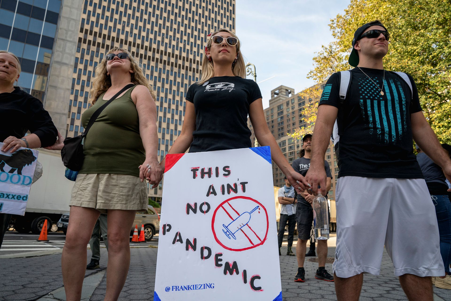 People gather during a protest against mandated coronavirus disease vaccines and vaccine passports in New York City on Sept. 27, 2021.