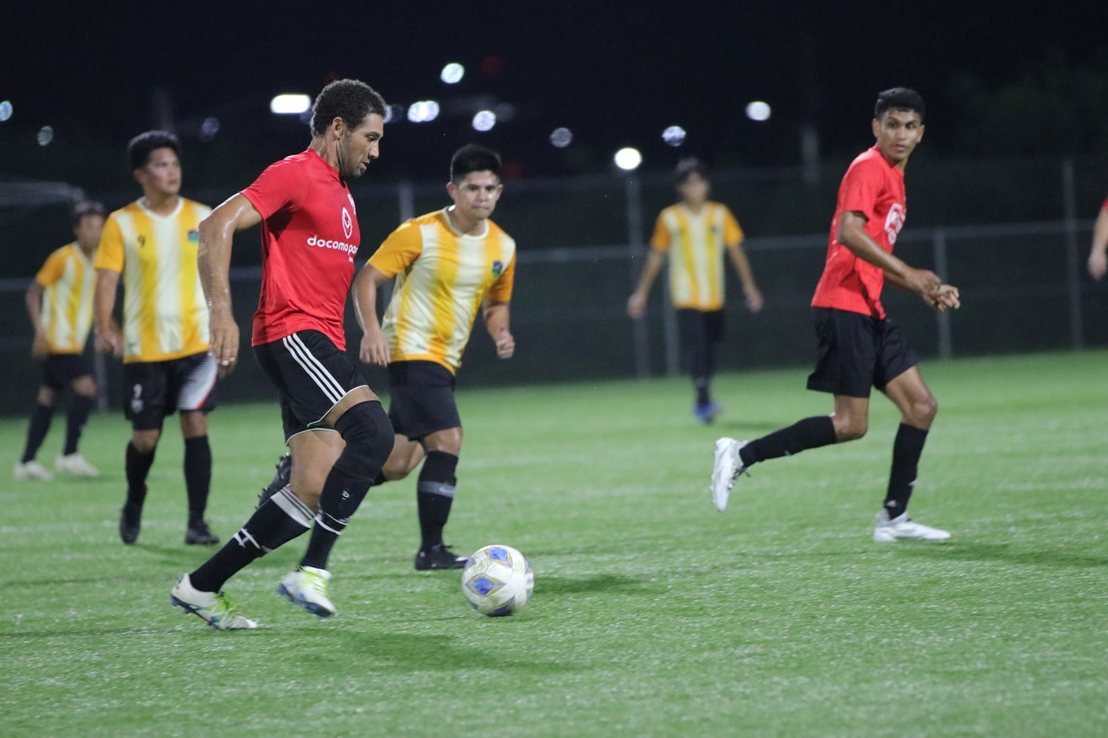 Paire's Ajani Burrell takes control of the possession during a game of the Marianas Soccer League on Sunday at the NMI Soccer Training Center.