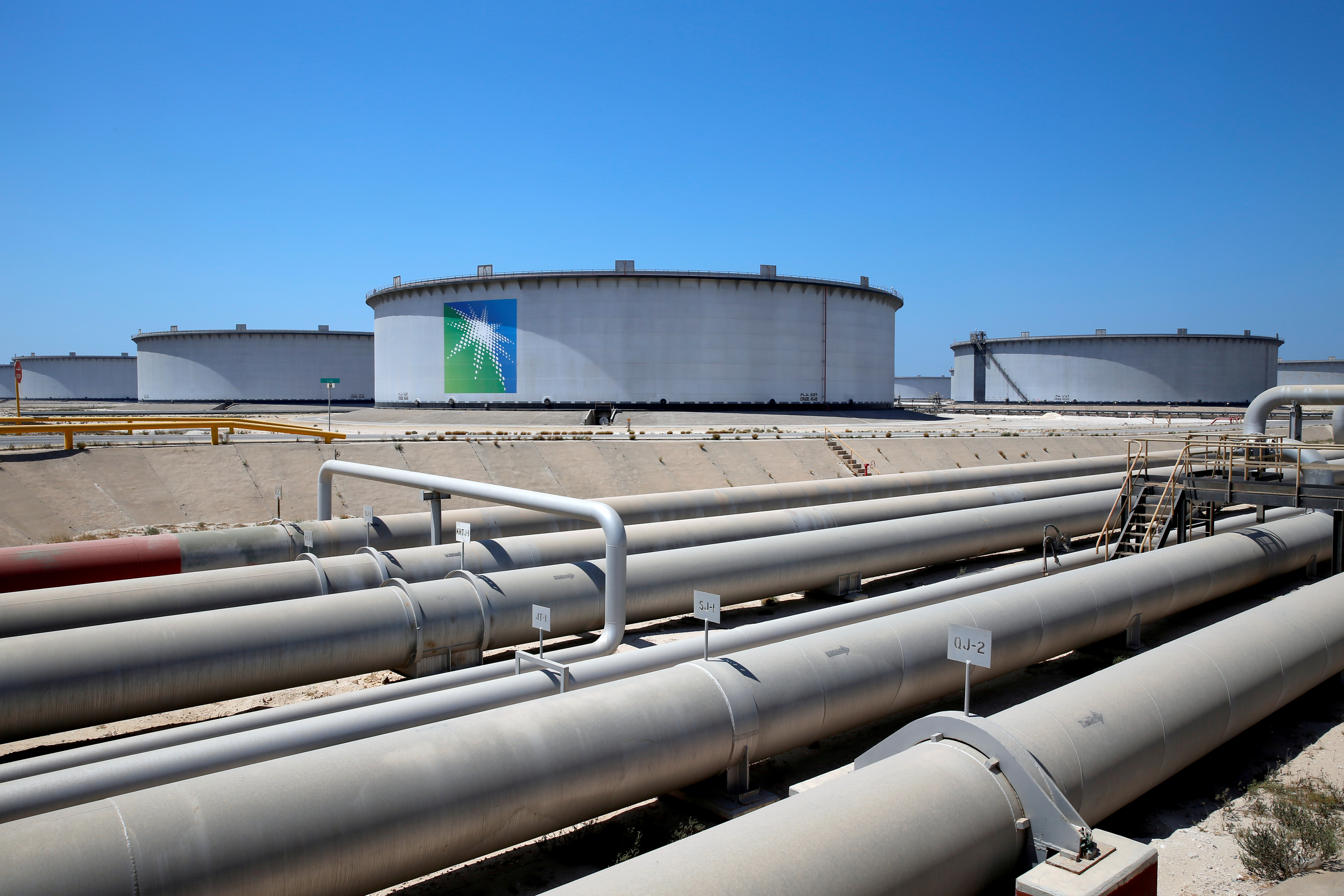 General view of Aramco tanks and oil pipe at Saudi Aramco's Ras Tanura oil refinery and oil terminal in Saudi Arabia on May 21, 2018.
