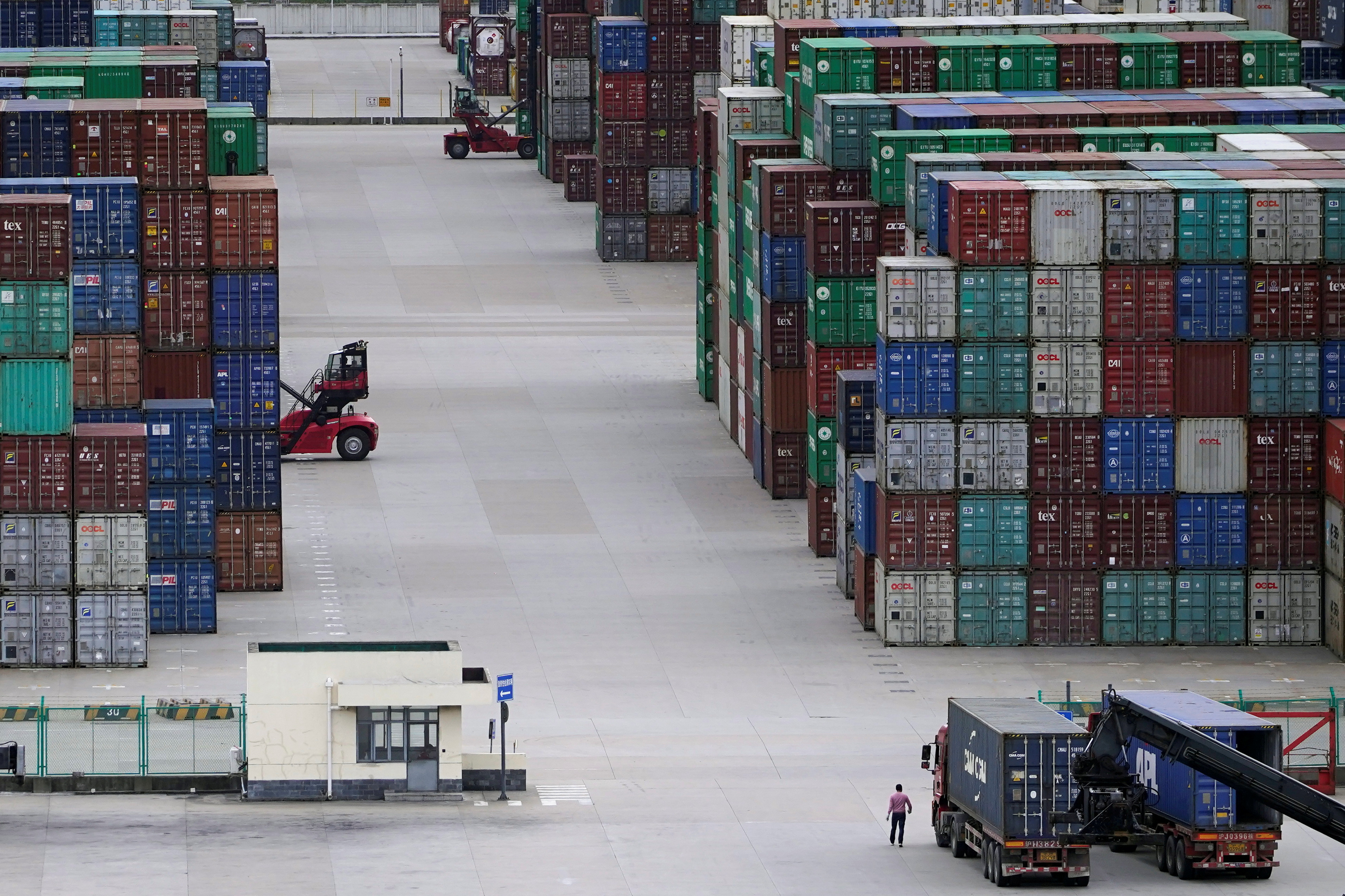 Containers are seen at the Yangshan Deep-Water Port in Shanghai, China on Oct. 19, 2020.