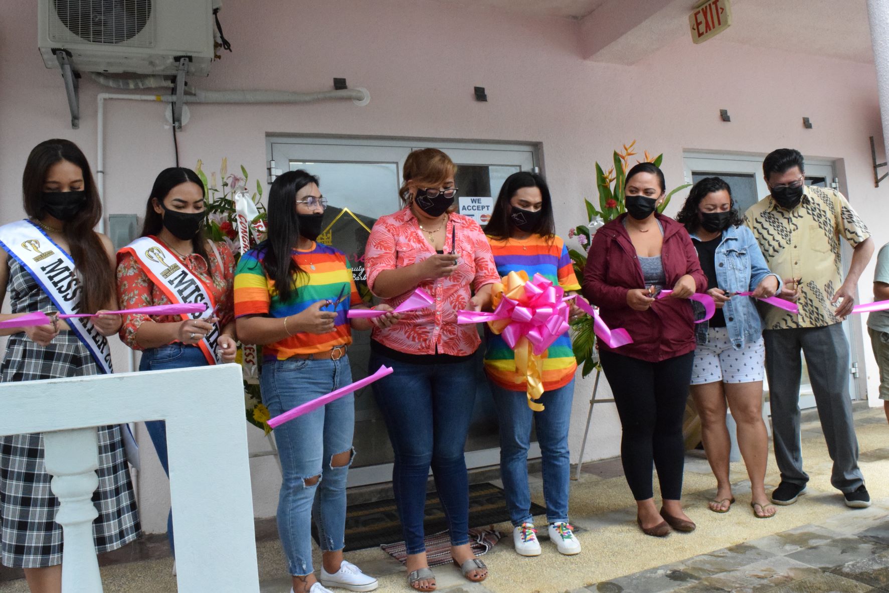 Empress Beauty Salon & Barber owner Tiffany Usenuku Yokoyama-Lizama, Rep. Sheila Babauta, Rep. Leila Staffler,  Rep. Edwin Propst, Miss Earth NMI-Miss Water 2020 Zoe Stephanson, Miss Fire 2021 Stephanie Borja,  hairstylists, Yana Osian and Rhaine Tumada cut the ceremonial ribbon during the grand opening of the salon on Saturday.
