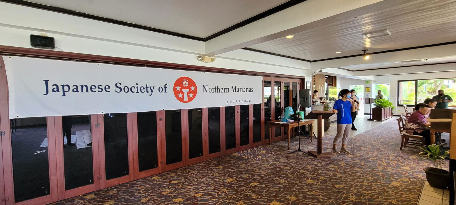 Japanese Society of the Northern Marianas vice president Hiroko Tajima describes the various dishes served at the first ever “Taste of Japan” event on Monday at Aqua Resort Club Saipan.