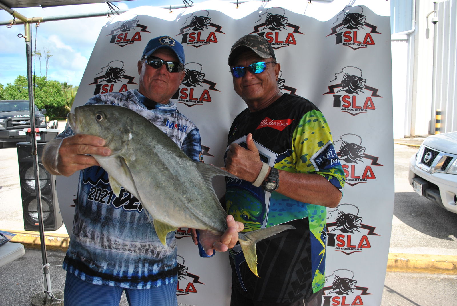 The Bradda Boys pose with their 7.55 lbs tarakito which won the derby side bet.