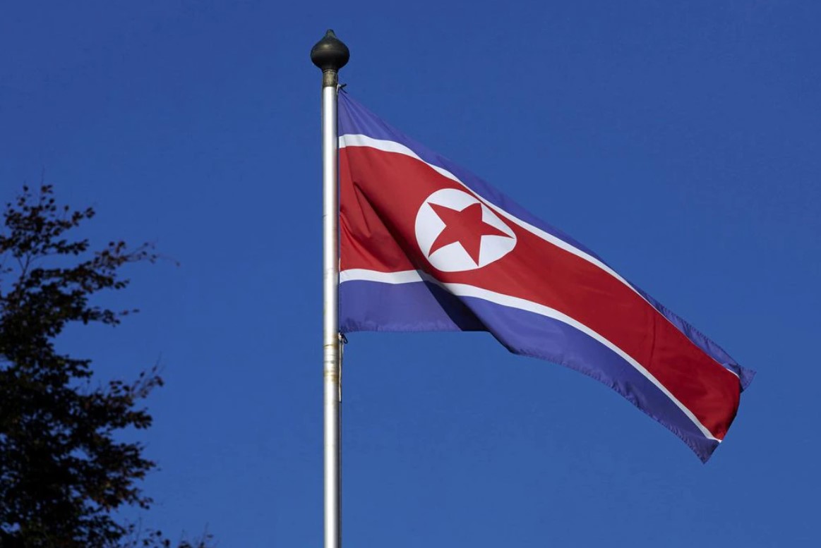 A North Korean flag flies on a mast at the Permanent Mission of North Korea in Geneva on Oct. 2, 2014.