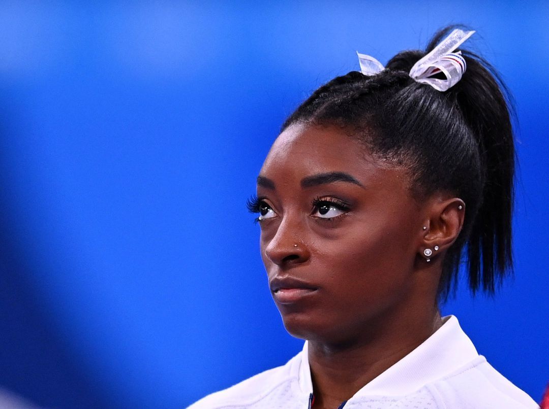 Simone Biles of the United States looks on during the women's gymnastics team final at the Tokyo Olympics in Japan on July 27, 2021.