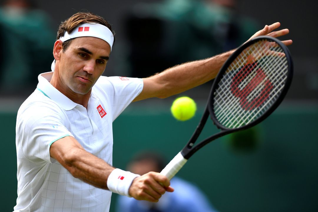 Switzerland's Roger Federer in action during his third round match at Wimbledon against Britain's Cameron Norrie on July 3, 2021