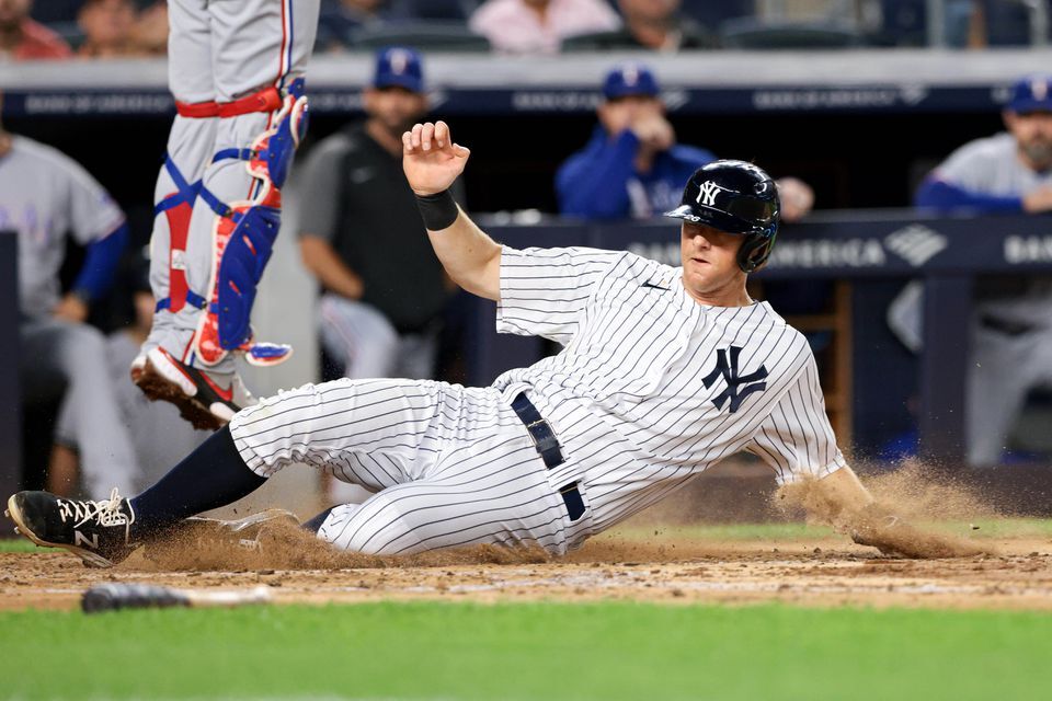 New York Yankees second baseman DJ LeMahieu (26) scores on a RBI single by Aaron Judge —not pictured — against the Texas Rangers during the third inning at Yankee Stadium in the Bronx on Sept. 20, 2021.