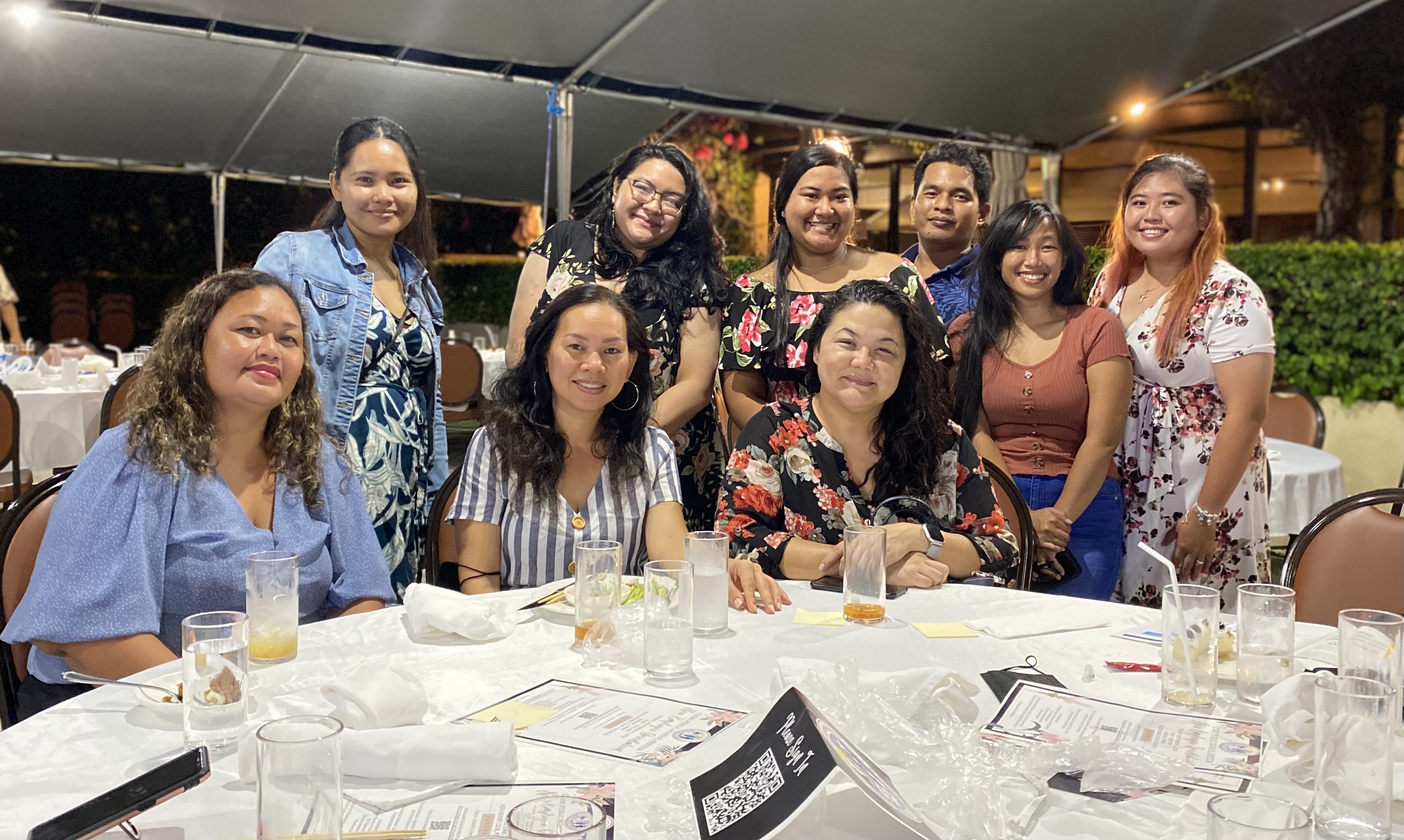 Koblerville Elementary School Principal Naomi Nishimura, 2nd left seated, and San Vicente Elementary School Principal Paulette Tomokane, right seated, pose for a photo with new employees CCLHS instructor Estefania Mensah, 2nd grade teacher Chelsea Encio Awit, 2nd grade substitute teacher Cristine Simsiman, special education teacher Aide Ale Teregeyo, kindergarten teacher Julie Lina, special education teacher aide Abbie Battung, and 1st grade teacher Hilaria Aldan.
