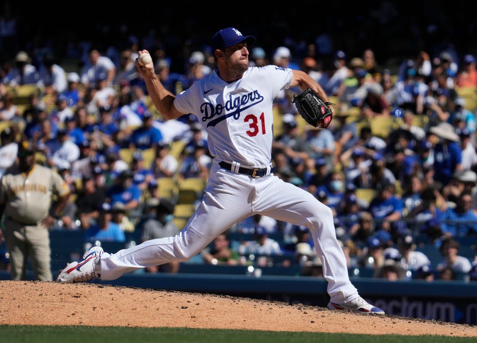 Los Angeles Dodgers starting pitcher Max Scherzer (31) throws a pitch in the seventh inning against the San Diego Padres at Dodger Stadium in Los Angeles, California on Sept. 12, 2021.