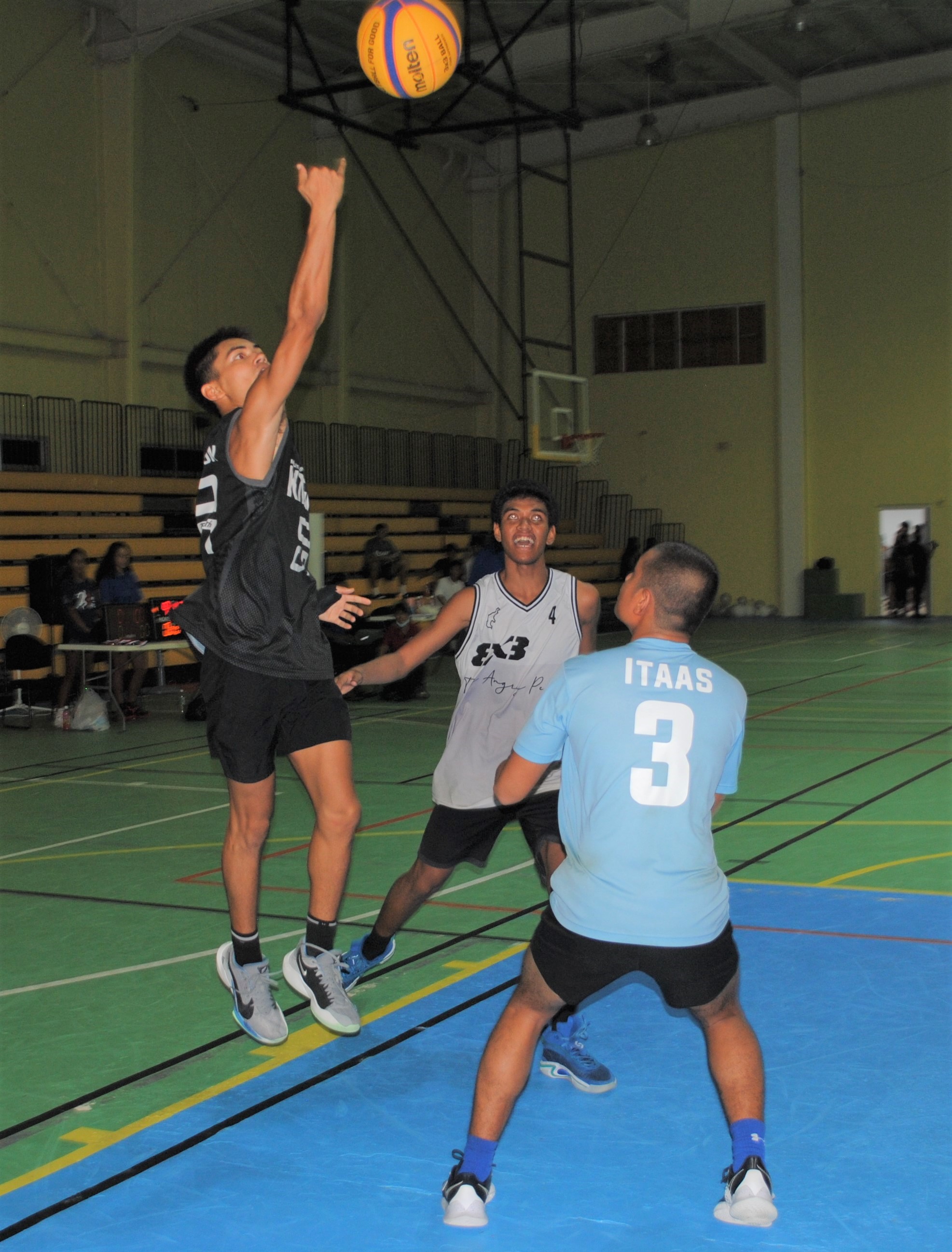 End Game's Matthew Richardson extends for the layup finish. 