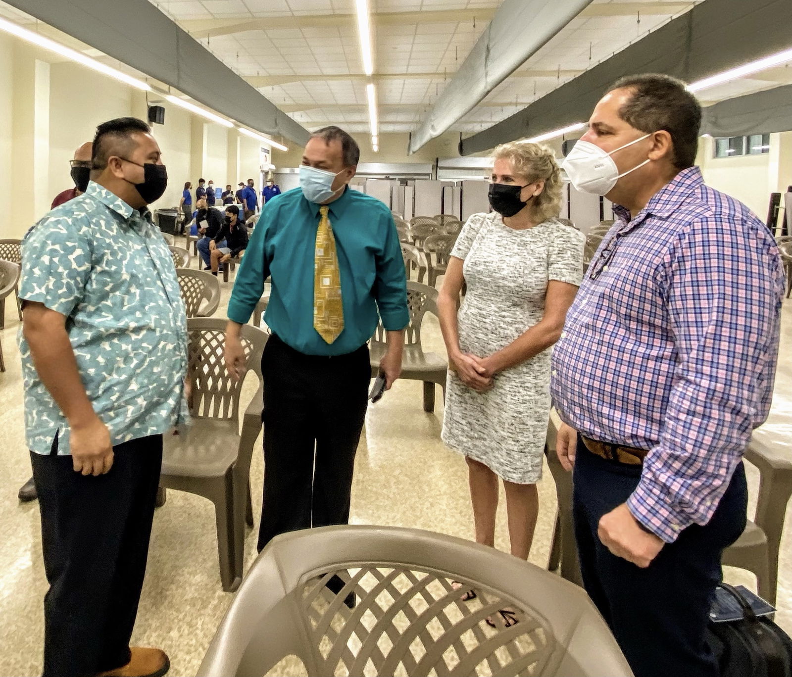 Gov. Ralph DLG Torres with Board of Education Chairman Andrew L. Orsini, Micronesia Renewable Energy Chief Operations Officer Jeffrey Voacolo and his wife Tracy.