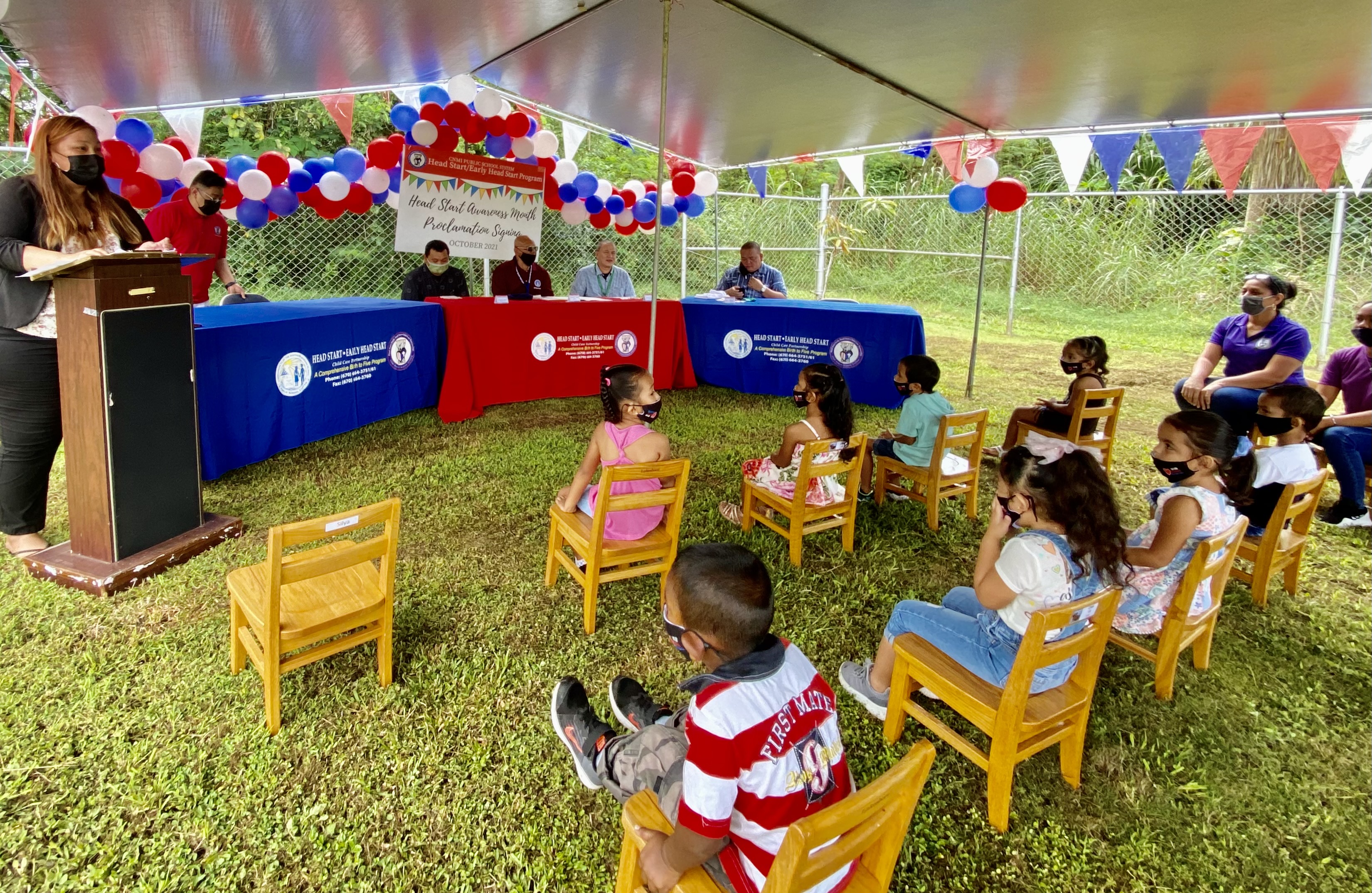 Head Start/Early Head Start Program Director Lathania Angui, left, speaks during the Head Start Awareness Month proclamation ceremony program at Sinapalo Head Start on Friday.