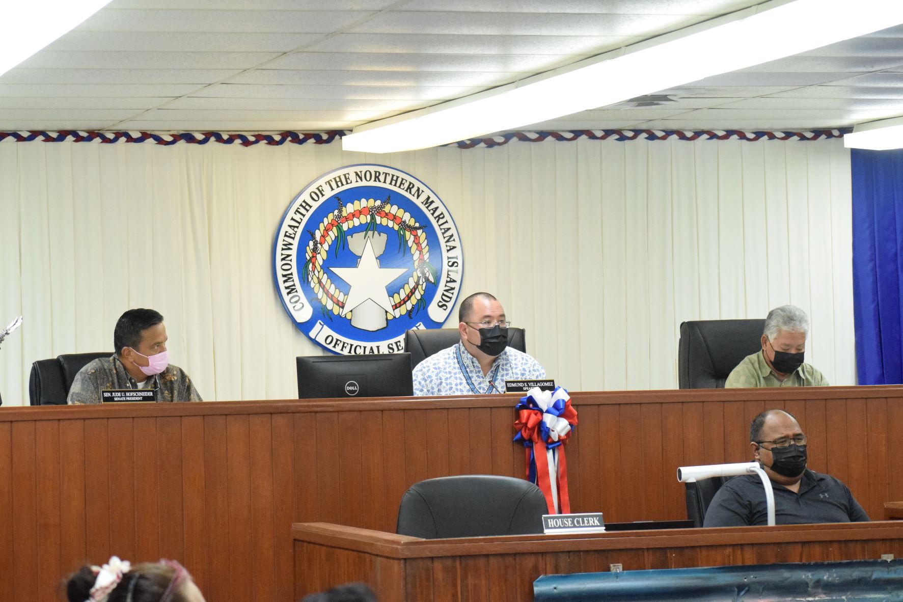 Speaker Edmund S. Villagomez, center, presides over the swearing in-ceremony for Rep. Corina L. Magofna in the House chamber on Wednesday. With him are Lt. Gov. Arnold I. Palacios, right, and Senate President Jude U. Hofschneider, left.
