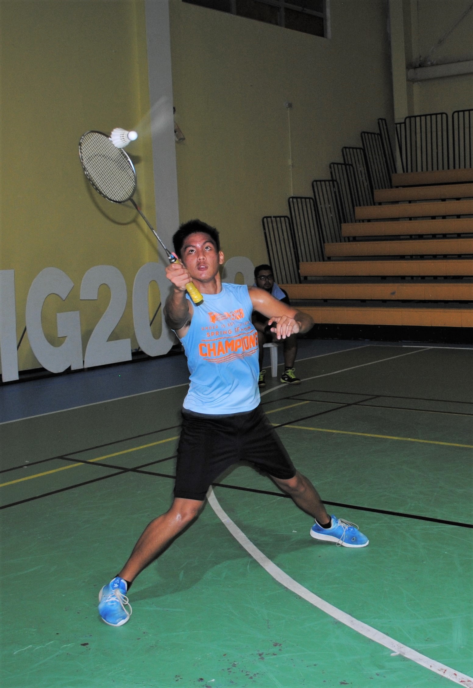 Ian Lubao extends for the save during a C Men's Doubles game of the TakeCare Badminton Open Tournament at Ada gym.