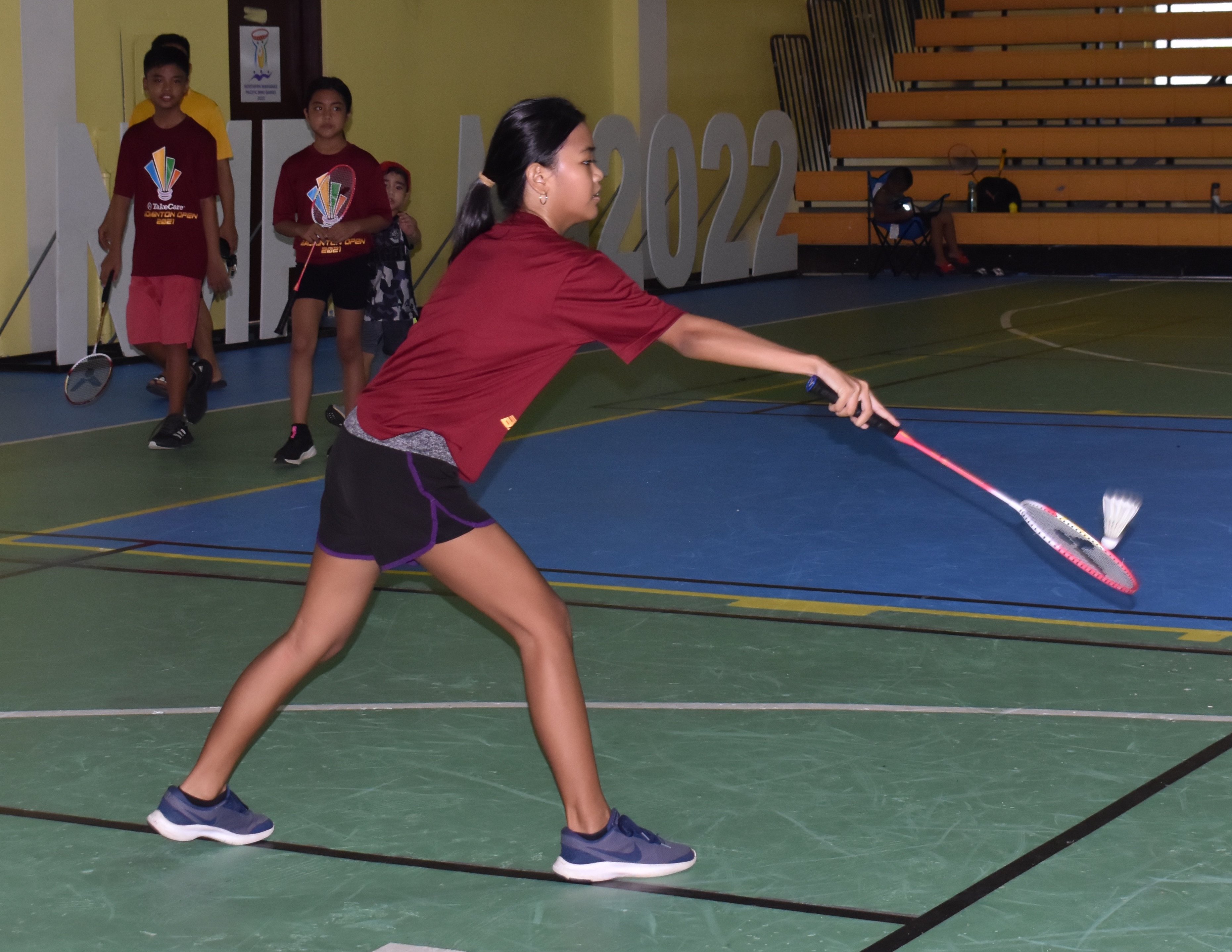 Charmaine Bautista returns to Mikayla Cunanan during a warm-up game in the junior division of the TakeCare Badminton Open 2021 Saturday at the Gilbert C. Ada Gymnasium.