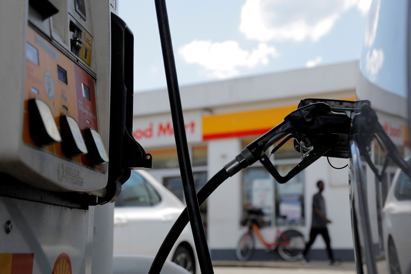 A gas pump is seen in a car at a Shell gas station in Washington, D.C. on May 15, 2021.