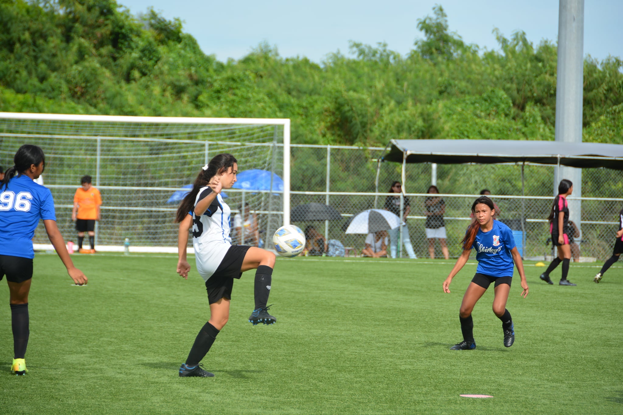 MP United's Cassie Regan attempts to control the possession during a U15 girls division game of the Youth League Fall tournament Saturday at the NMI Soccer Training Center.