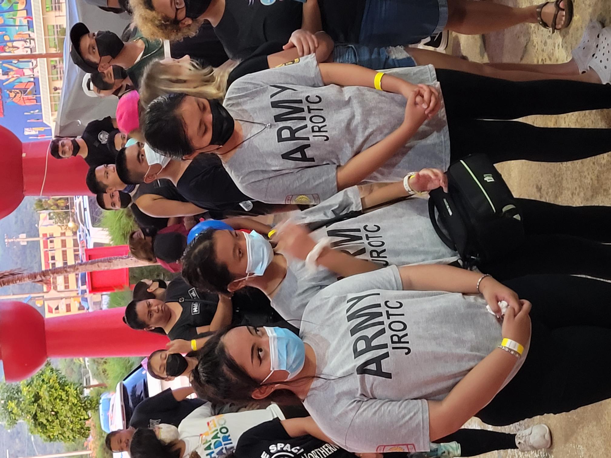 Saipan Southern High School JROTC cadets join the other event participants in a prayer before the start of  the Light Up the Night Walk to raise awareness on suicide prevention Thursday at the Minachom Atdao pavilion.