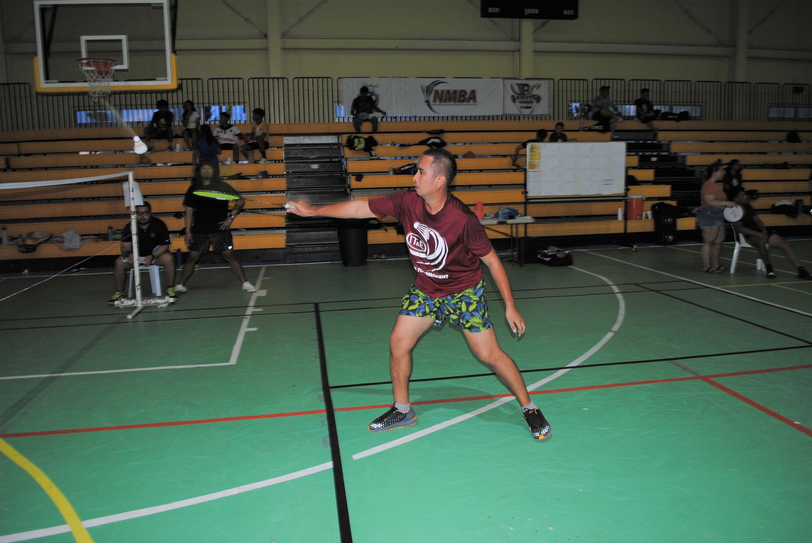 Sefric Veloria  extends for the lob return during a TakeCare Badminton Open game at the Ada gym.