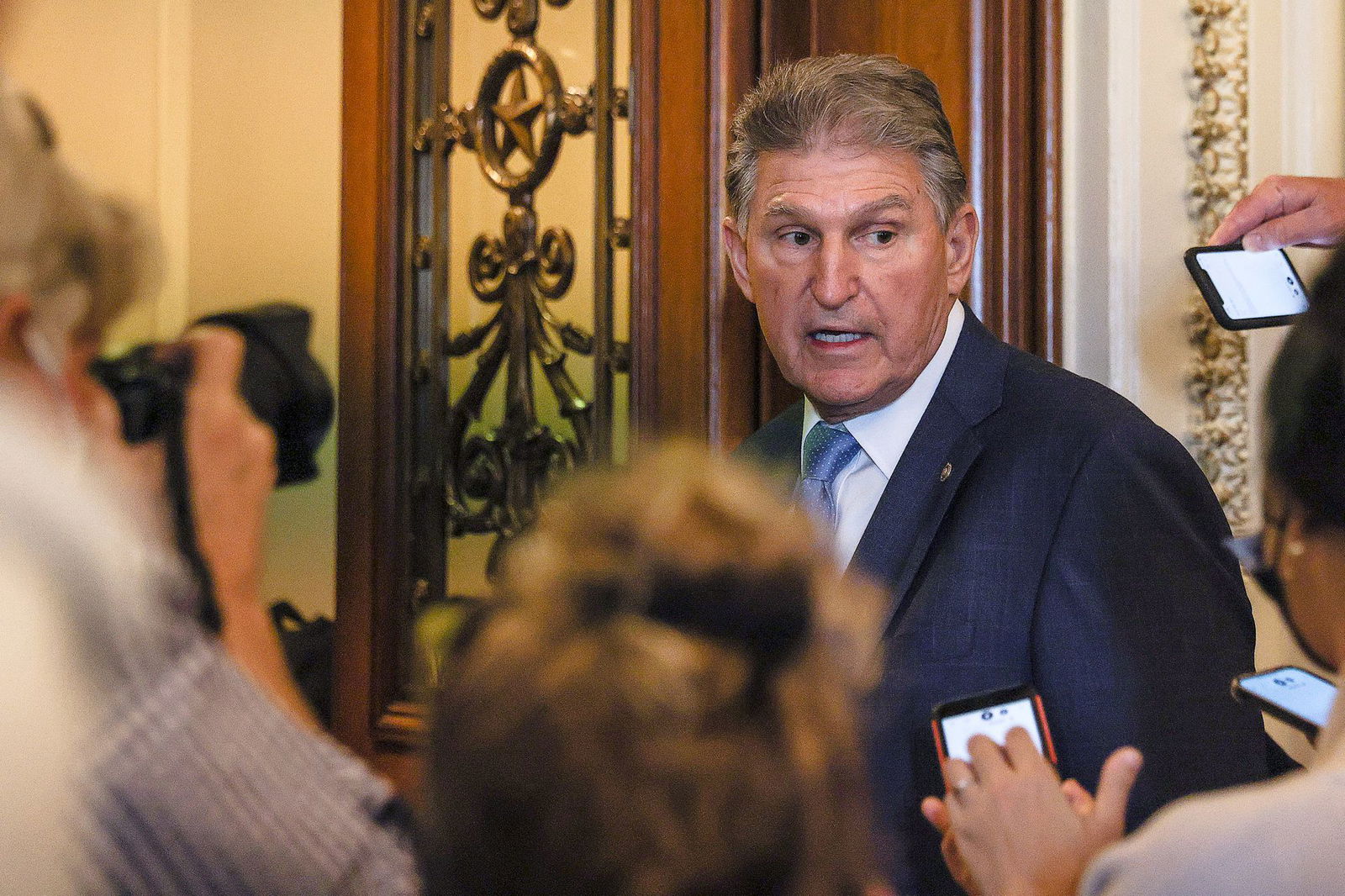 U.S. Sen. Joe Manchin, D-WV, faces reporters after it was announced that the U.S. Senate reached a deal to pass a $480 billion increase in Treasury Department borrowing authority, at the U.S. Capitol in Washington, D.C., Oct. 7, 2021.