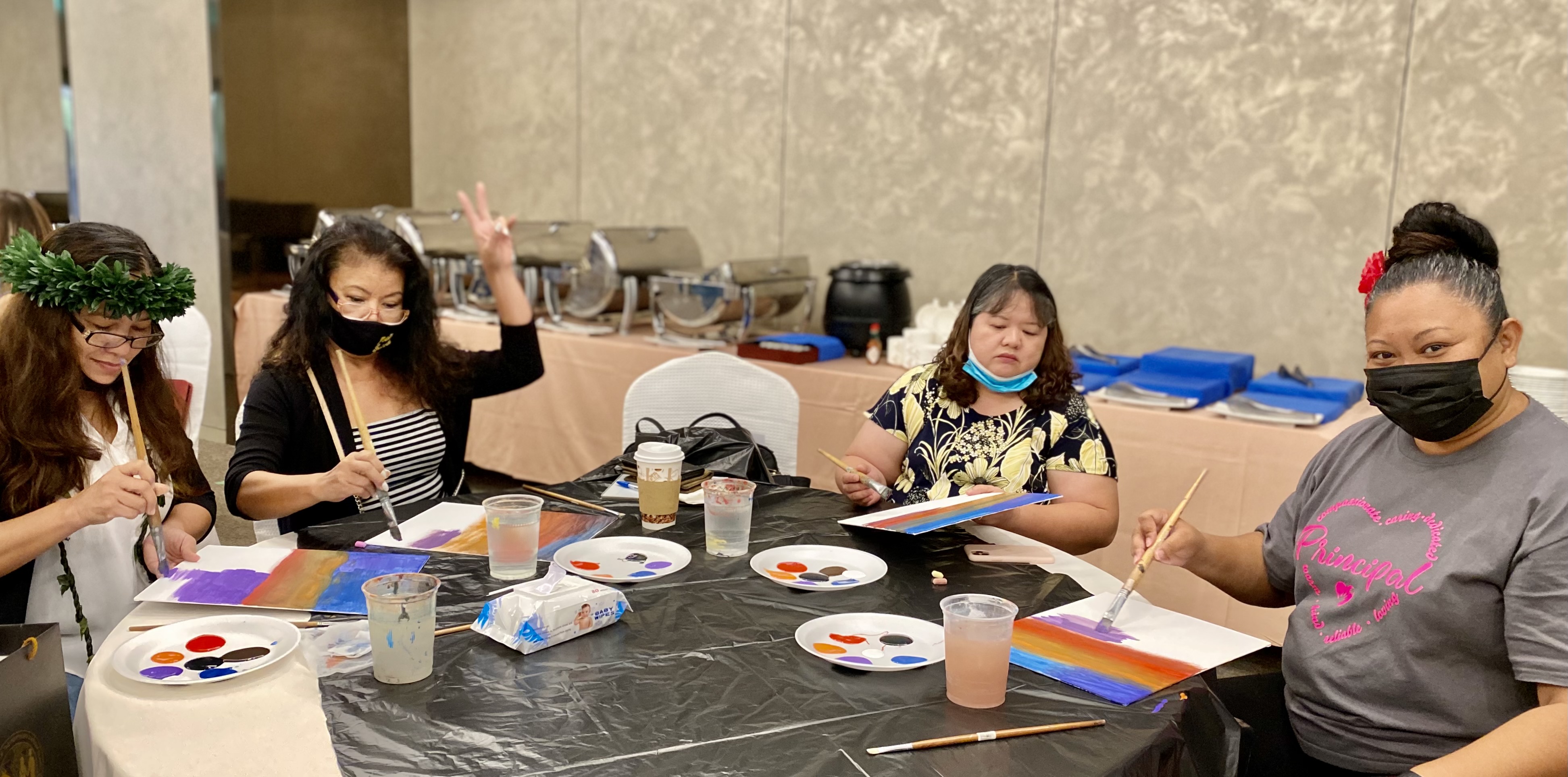 Principals Hilda Rios (Tanapag Middle School), Liz Hofschneider (Tinian Jr. Sr. High School), and Cherlyn Osung (Francisco M. Sablan Middle School) with Dr. Rizalina Liwag, PSS senior director for accountability, research and evaluation.