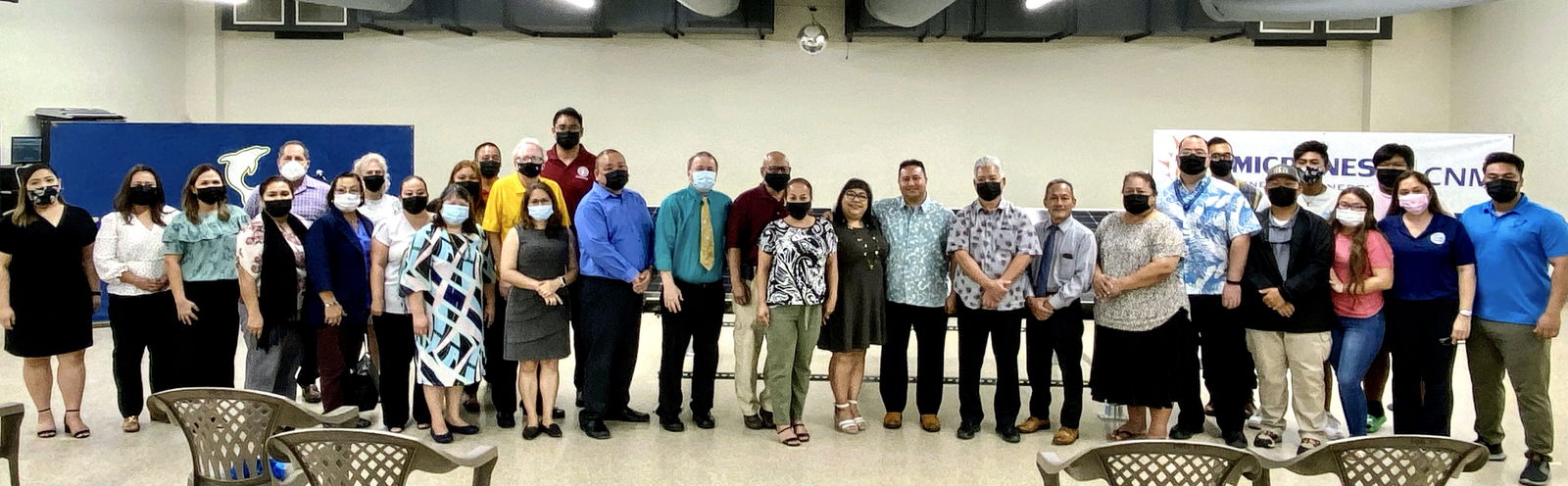 Public school students and education officials led by acting Commissioner of Education Eric Magofna, Board of Education Chairman Andrew L. Orsini, Vice Chairman Herman Atalig and BOE member Antonio Borja pose for a photo with former BOE Chairwoman Janice Marie A. Tenorio, Gov. Ralph DLG Torres, Lt. Gov. Arnold I. Palacios, Micronesia Renewable Energy Chief Operations Officer Jeffrey Voacolo and lawmakers led by Speaker Edmund Villagomez and Senate President Jude Hofschneider after the  unveiling of the solar energy system initiative of the Public School System in the Marianas High School cafeteria.