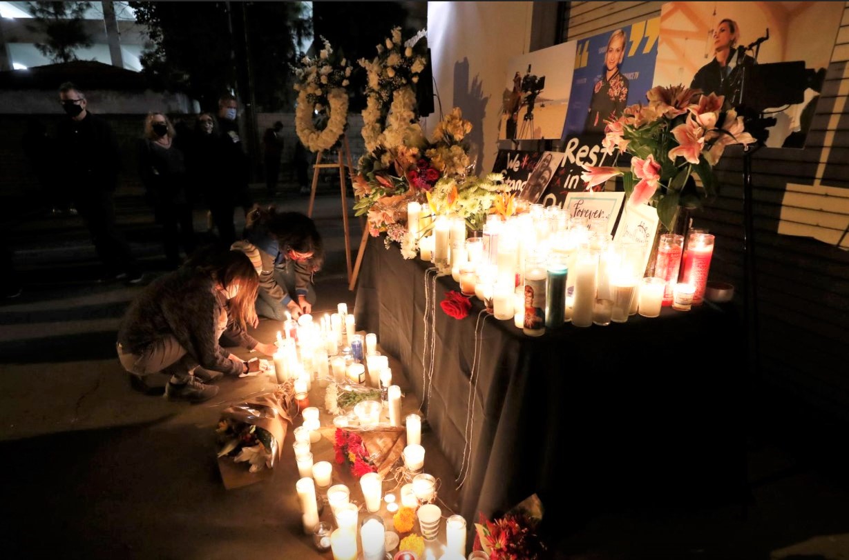People attend a vigil in Burbank, California on Oct. 24, 2021 for cinematographer Halyna Hutchins who was fatally shot on the film set of "Rust."