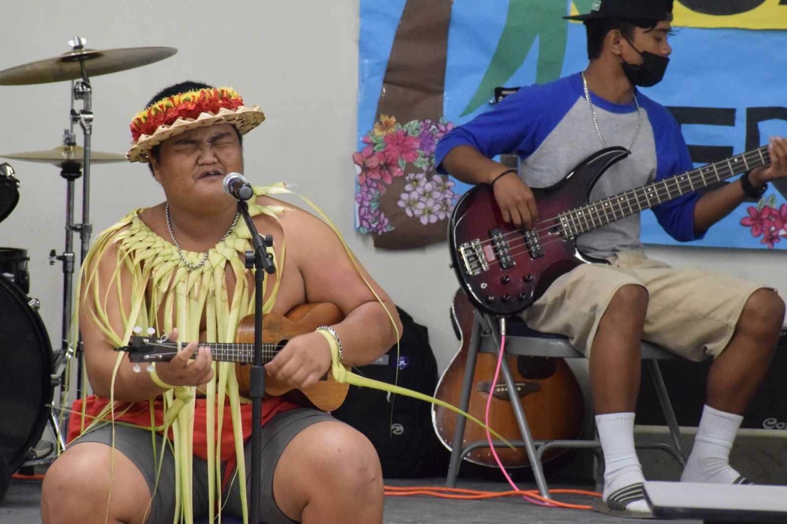 Senior student Sonny Kaipat plays a ukulele while singing.