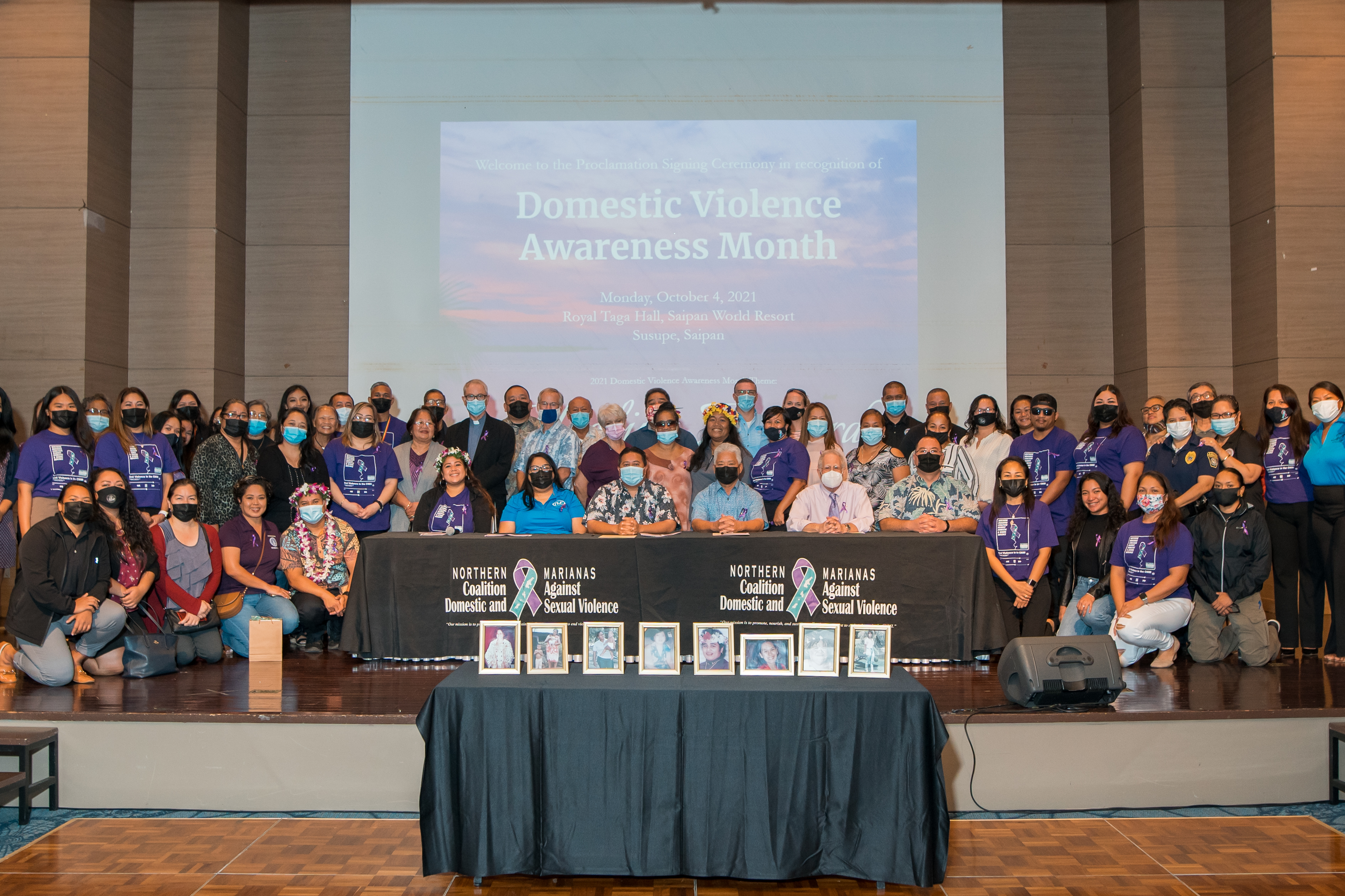 Gov. Ralph DLG Torres, Lt. Gov. Arnold Palacios, Associate Judge Kenneth L. Govendo and House Speaker Edmund Villagomez join advocates, partners, stakeholders, and sponsors for a group photo after  the signing of the 2021 Domestic Violence Awareness Month Proclamation at Saipan World Resort on Monday.