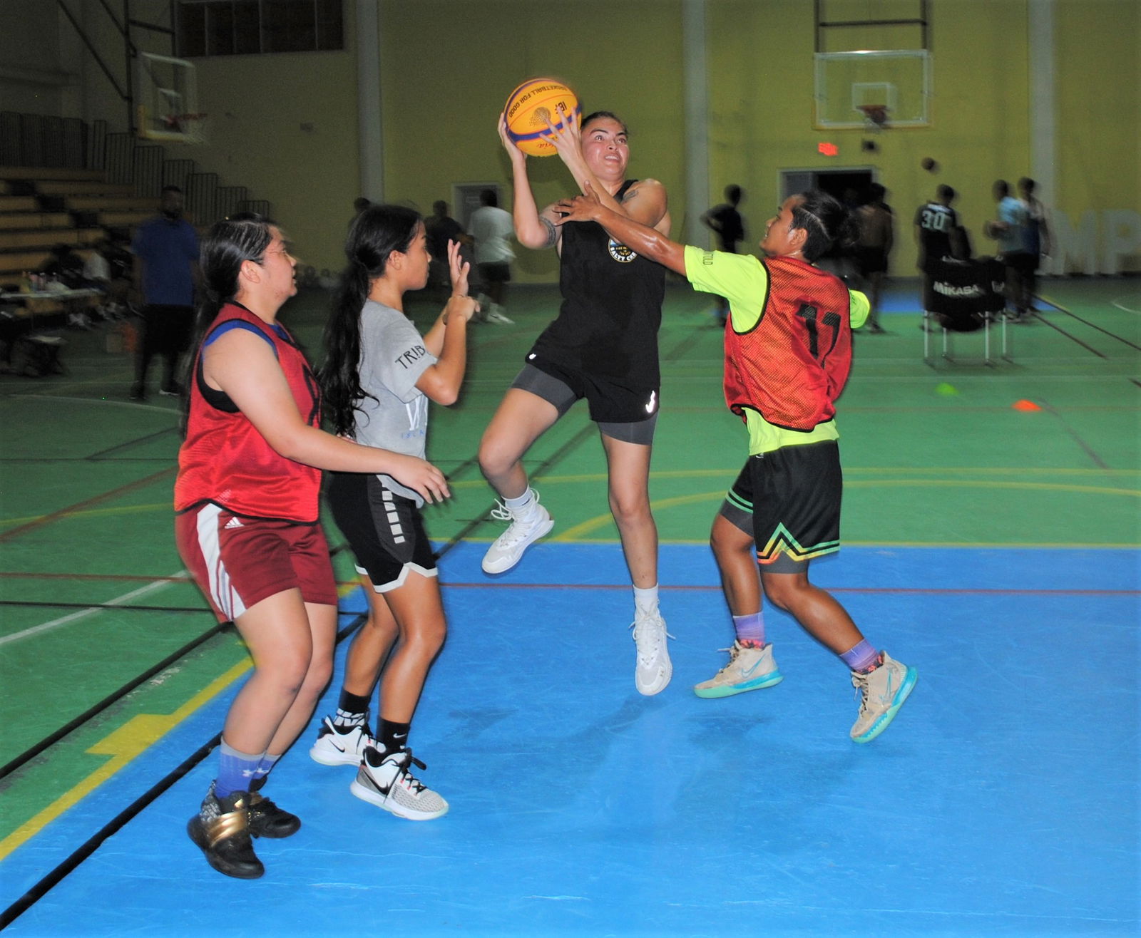 SHAMMII's Mikki Kautz rises for the shot as she gets fouled during the women’s championship game of the NMI Basketball Federation 3x3 Hoop Fest at the Ada gym on Saturday.
